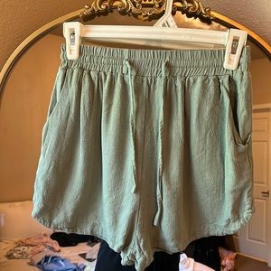 Green linen shorts